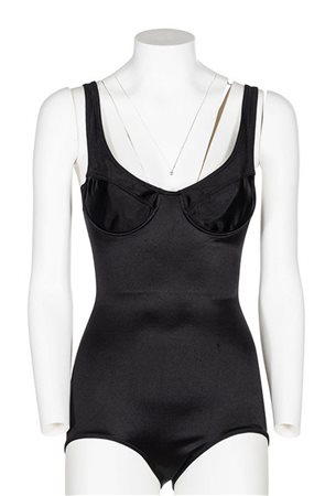 Azzedine Alaia ICONIC CUT OUT BODY Description: Iconic black body with...