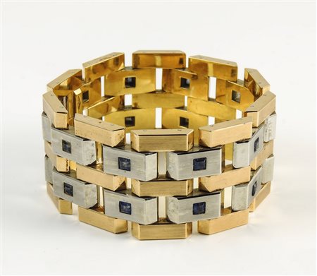 BRACCIALE IN ORO GIALLO E BIANCO Anni Trenta/Quaranta realizzato a binari...