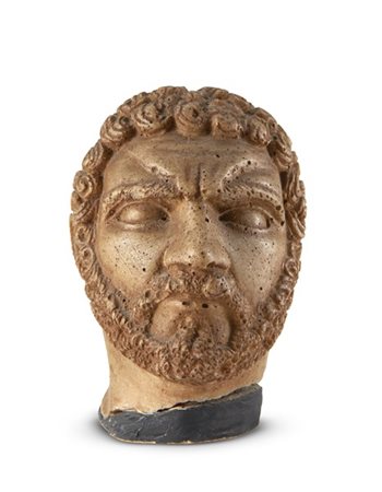 Antica testa virile raffigurante Caracalla in marmo scolpito. Base di epoca pos