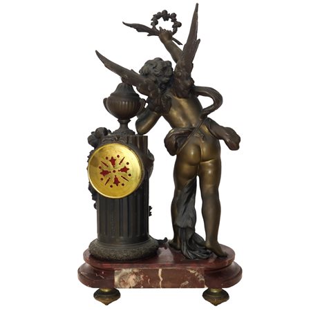 Orologio con putto in bronzo