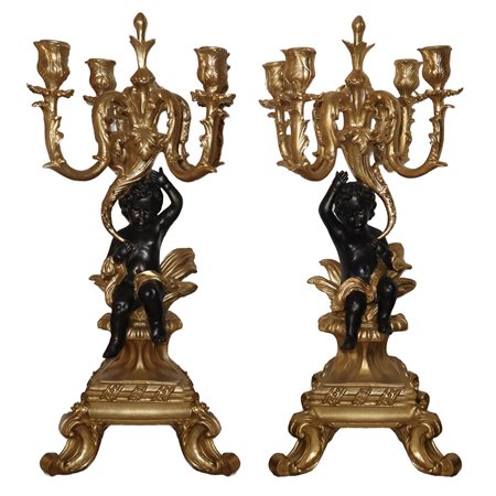 Coppia di candelabri in stile barocco a 5 luci