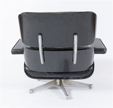 HERMAN MILLER Poltrona, modello 670 in palissandro scuro e pelle nera (1950 -...