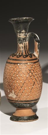 Lekythos a reticolo nello stile di GnathiaMateria e tecnica: argilla rosata,...