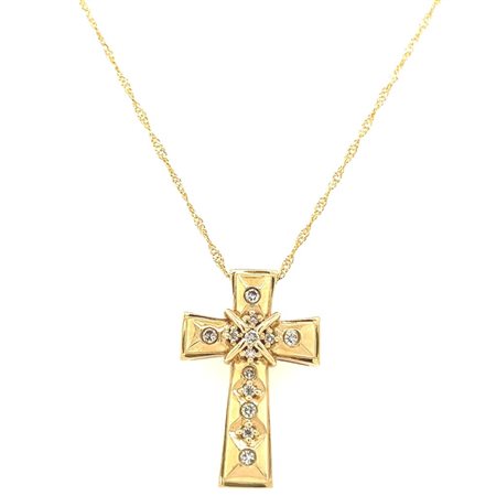 GIROCOLLO IN ORO GIALLO 14K A FORMA DI CROCE 4.78 GR CON DIAMANTI PER 0.20...