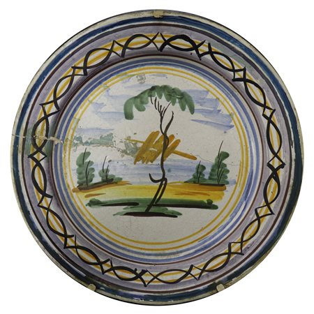 Piatto in maiolica di Caltagirone Al centro paesaggio fluviale con alberi, Mid 20th  