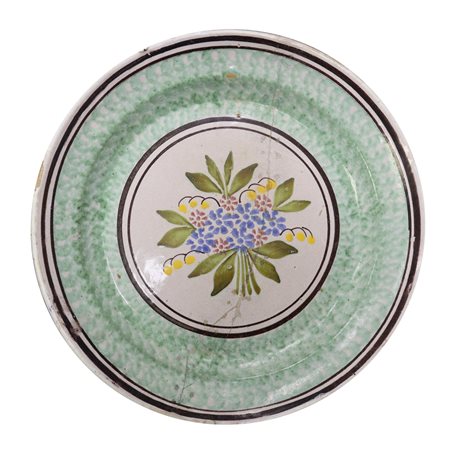 Piatto in maiolica di Caltagirone spugnato verde, con fiore al centro, First half of the 20th  