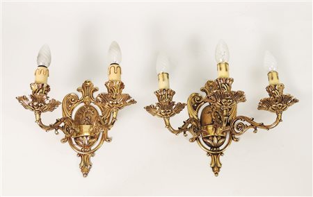 SERIE DI OTTO APPLIQUES IN METALLO DORATO - EIGHT GILDED METAL WALL LAMPS...