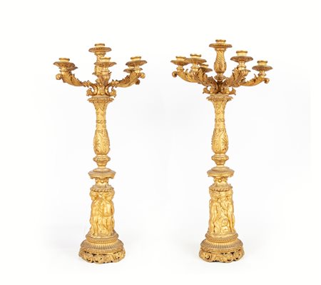 Coppia di candelabri in bronzo dorato a sette luci, XIX secolo altezza cm 68...