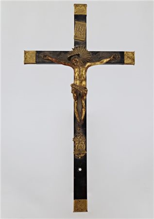 Crocifisso in bronzo dorato su croce in legno ebanizzato, secolo XIX (cm tot. 3