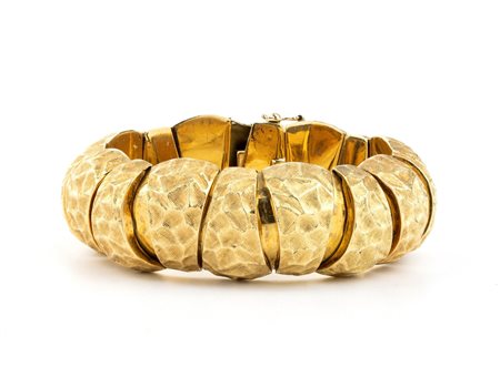 Bracciale a maglie snodate in oro in oro giallo 18k, maglie e texture di...