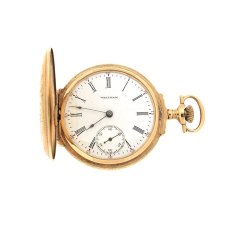 WALTHAM Orologio da tasca inizi XX secolo Diam 48 Tripla cassa in oro incisa...