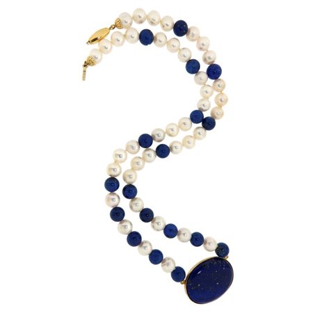 COLLANA DI PERLE Collana composta da perle di acqua dolce alternate a sfere...