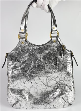 Yves Saint Laurent METROPOLIS BAG DESCRIPTION: Silver leather tote bag with...