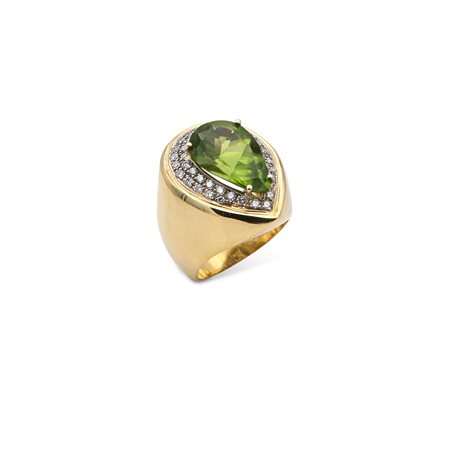 Anello in oro, peridoto e brillanti Oro giallo 750/000. Peridoto in taglio...