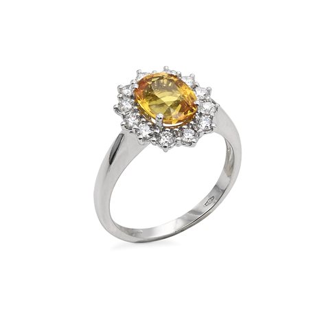 Anello in oro, zaffiro giallo e brillanti Oro bianco 750/000. Zaffiro giallo...