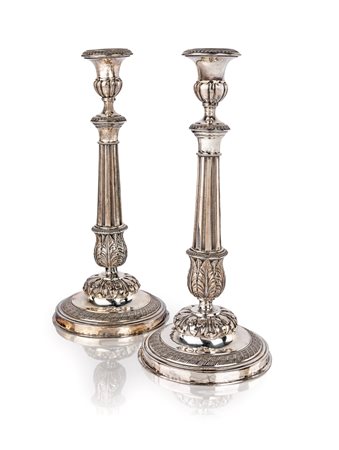 Coppia di candelieri in argento, Roma, dopo il 1815 portacandela a forma di...