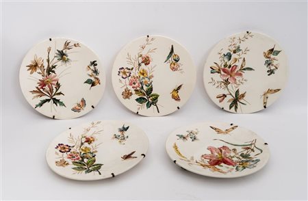 Servizio di cinque piattini con decoro a fiori e farfalle della Società Ceramica Richard.   Società Ceramica Richard, ultimo quarto del XX secolo