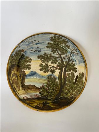Piatto in maiolica decorato con paesaggio   Manifattura di Castelli del XVIII secolo