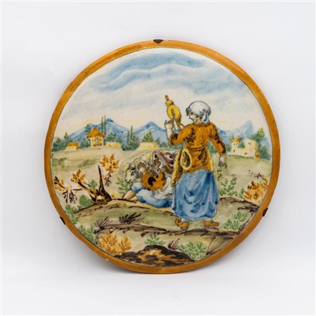 Tondo in maiolica con donna che fila e pastorello con pecora   Tito Barnabei