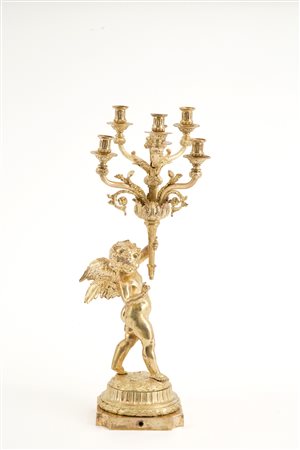 Candelabra with putto in gilded bronze