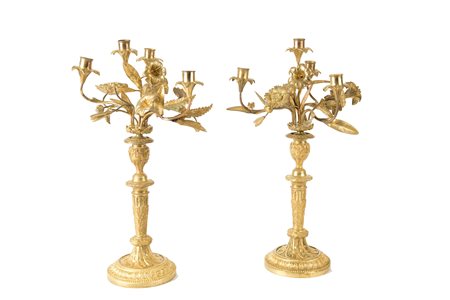 Two candlesticks transformable into a candelabra