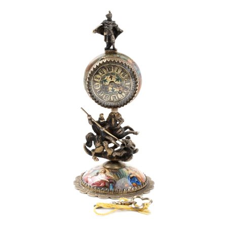  Orologio da tavolo in argento e smalti. Austria, XIX secolo