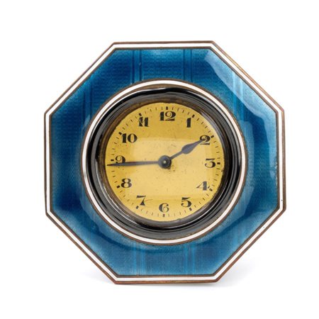  Orologio da tavolo Art Déco in metallo e smalti. Anni '20 - '30