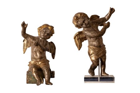 Coppia di putti in cartapesta argentata e dorata   Manifattura dell'Italia centrale del XVIII secolo