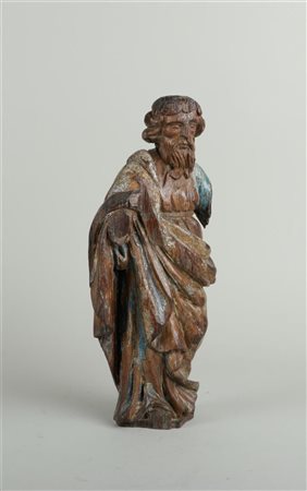 A wooden late Gothic sculpture of a saint, remains of original polychromy....