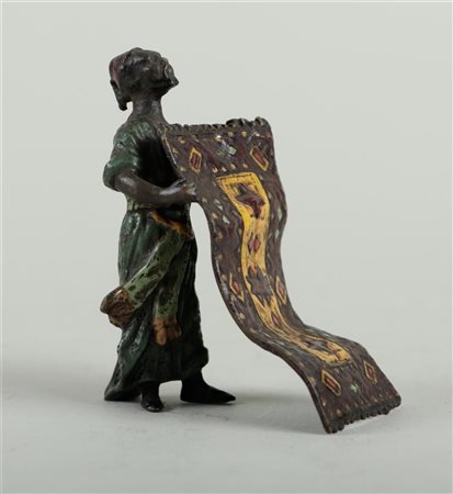 A Viennese, cold painted bronze 'the carpet dealer', marked in the base:...