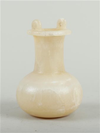 A white travertine / alabaster situla, restored. New Kingdom: 1550 - 1070 BC....