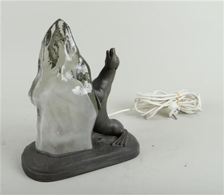 An Art Deco table lamp in the shape of a seal on an iceberg. Circa 1920. 28 x...