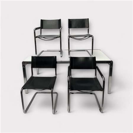 A design set of a white table and Matteo Grassi chairs. Chairs marked. Table...