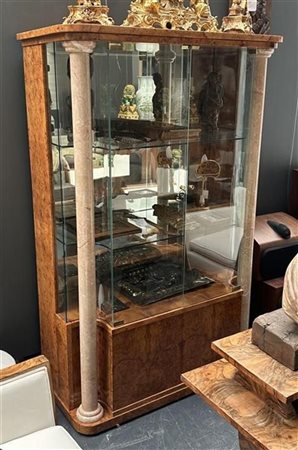 A high-gloss lacquered display cabinet with tempered glass with two tempered...