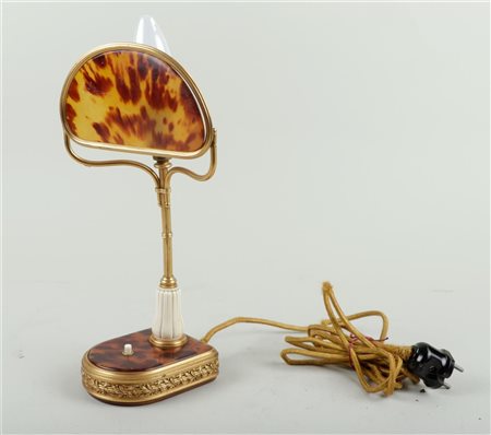 A partly gilded tortoiseshell table lamp. France, 1st half 20th century. H....