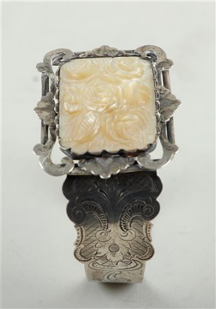 A 19th century engraved silver bracelet with carved mother of pearl in rose...