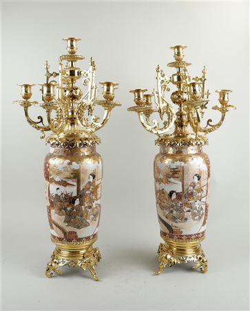 A pair of 5 light satsuma gilt candlesticks with bronze base in the shape of...