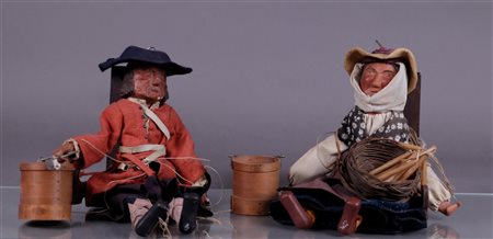 A pair of Breton marionettes in original costume, late 19th century. 55 cm.