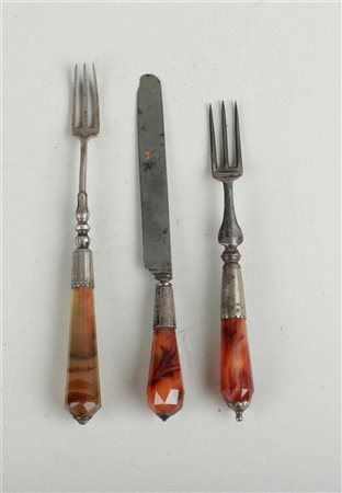 An antique Dutch travel cutlery set consisting of two silver forks and a...