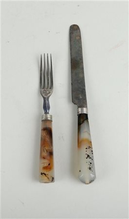 An early 18th century partly silver cutlery set consisting of a knife and...