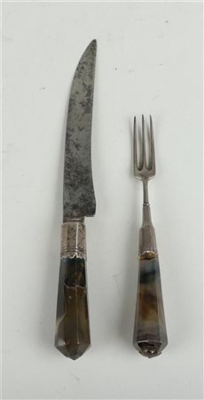 An early 18th century partly silver cutlery set consisting of a knife and...