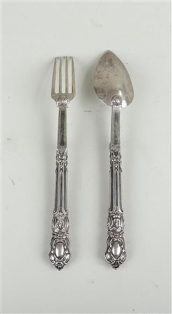 A set of silver folding cutlery consisting of a spoon and a fork in rococo...