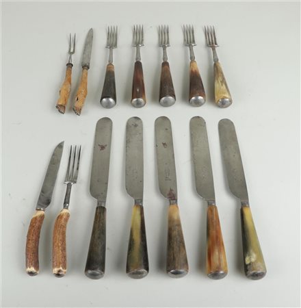 A lot of various knives and forks with horn handles. End of the 19th century.