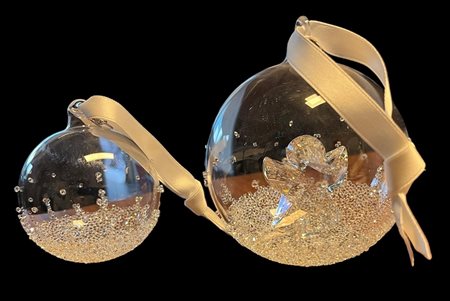 Swarovski, two Christmas ornaments. In original box.