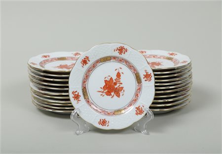 A set of 23 plates in Apponyi orange decor. Herend, 20th century.Diam. 12,5 cm.