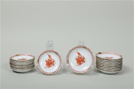 Set of 19 bowls in Apponyi orange decor. Herend, 20th century.Dianm. 9 - 10 cm.