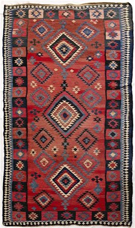 Tappeto Kilim, Anatolia, inizio secolo XX. Decoro con tre medaglioni romboidali