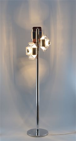 A floor lamp A three-light lamp, Italy 1960&#39;sA chromed metal floor...
