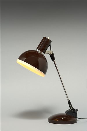 A table lamp A metal table lamp,&nbsp;Italy 1960&#39;sVarnished metal desk...