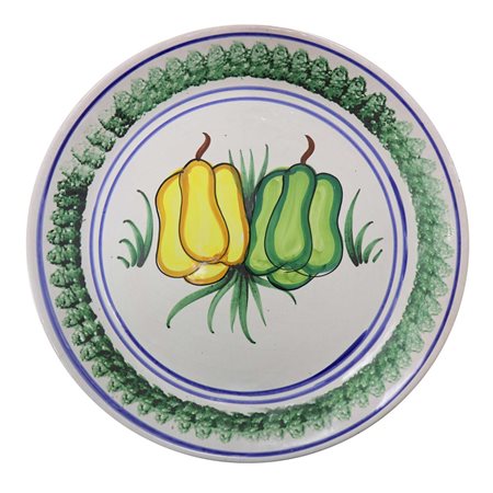 Piatto in maiolica di caltagirone spugnato raffigurante peperoni, 1970